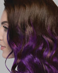 A photo of a model wearing Splat Hair Color's Purple Plum Hair Dye