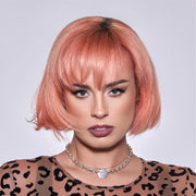 A photo of a model wearing Splat Peachy Coral Hair Dye