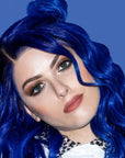 A photo of a model wearing Blue Envy &  Lightening Bleach Hair Dye