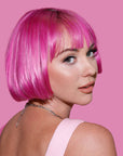 A photo of a model wearing Color Crush Pink Hair Dye