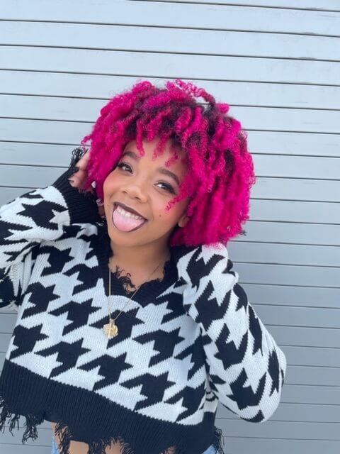 A photo of a model wearing Pink Splat Hair Dye