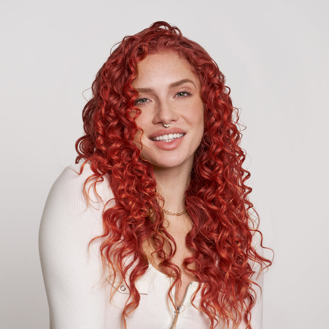 A photo of a model wearing Red Hair Dye