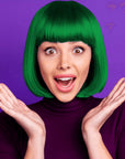 A photo of a model wearing  Splat Hair Color's  Lightening Bleach & Neon Green Hair Dye