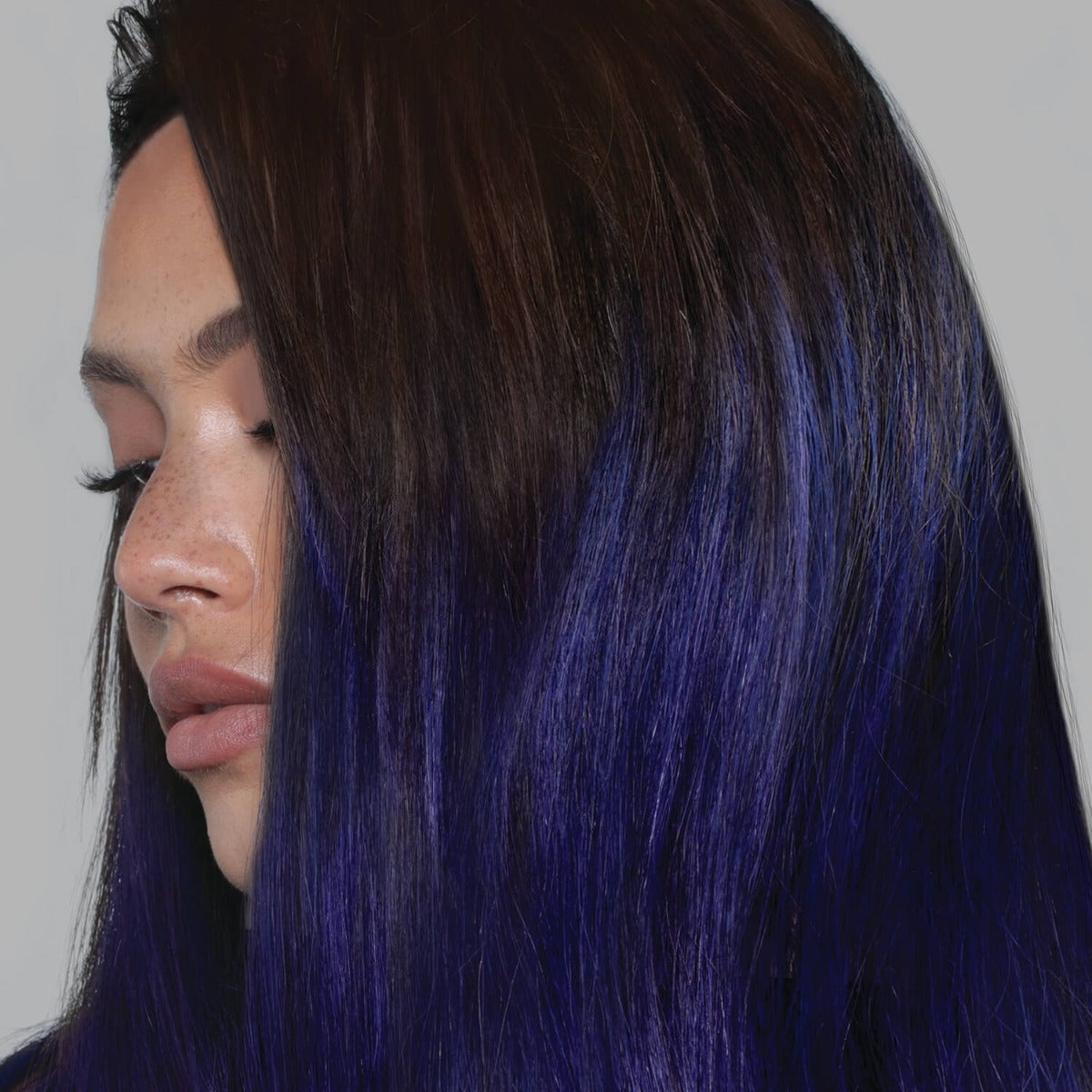 A photo of a model wearing Splat Hair Color&#39;s Blueberry Hair Dye