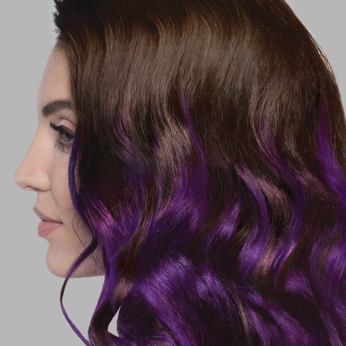 A photo of a model wearing Splat Hair Color's Purple Plum Hair Dye