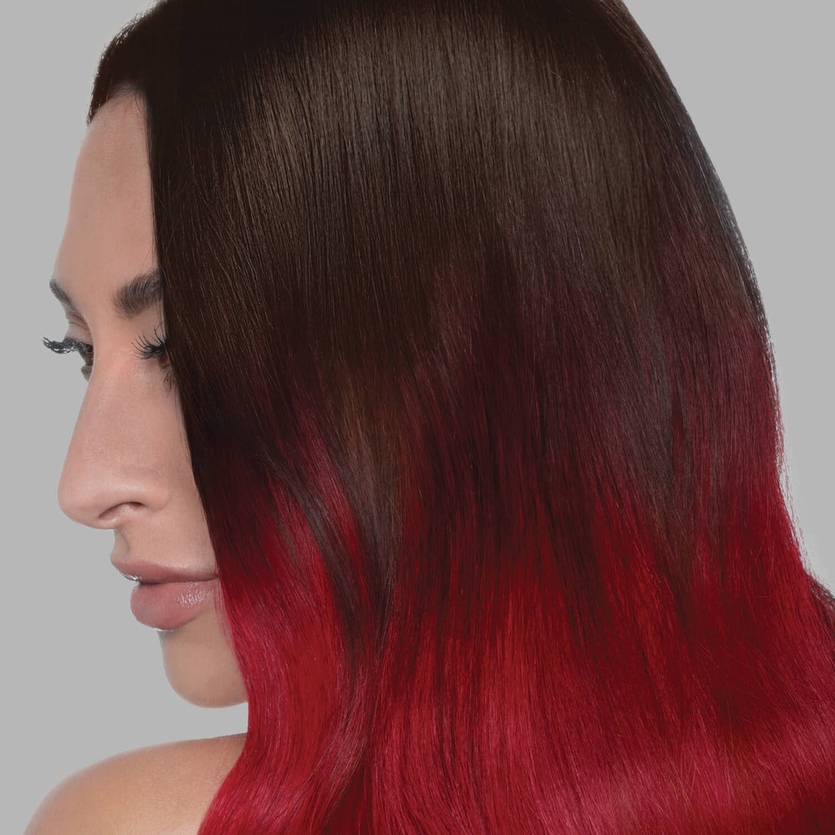 A photo of a model wearing Splat Hair Color's Strawberry Hair Dye